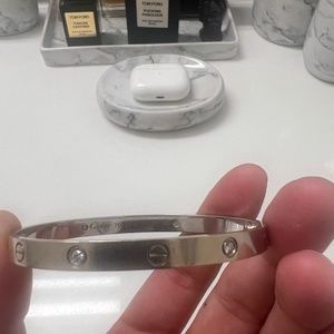 white gold cartier love bracelet with 4 diamonds. size 21